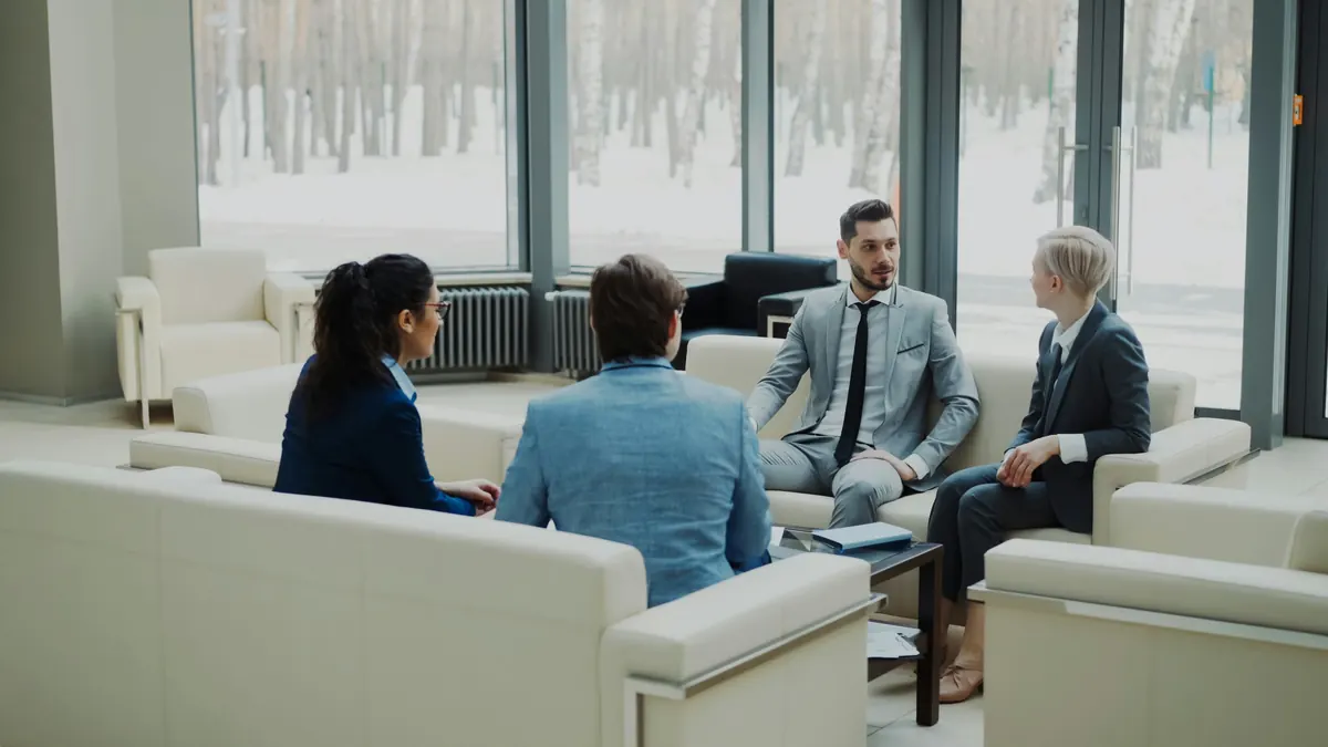 Professionals collaborating in a modern office