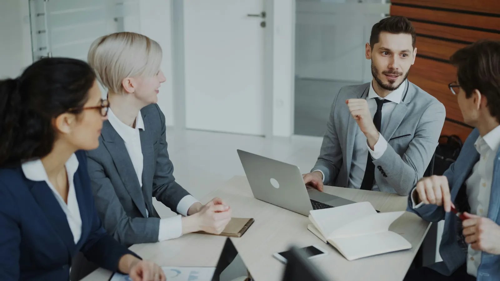 Executives reviewing technology strategy in a modern office